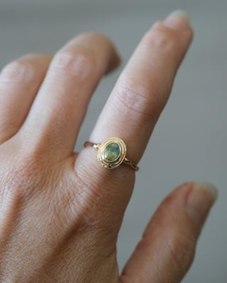 Opalescent Sea Green Oval Sapphire Ring