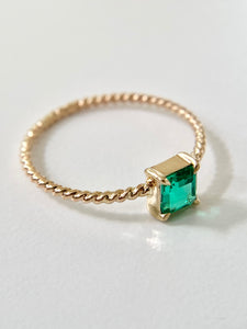 Delicate Emerald Twist Ring