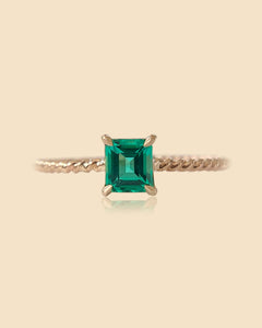 Delicate Emerald Twist Ring