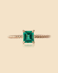 Delicate Emerald Twist Ring