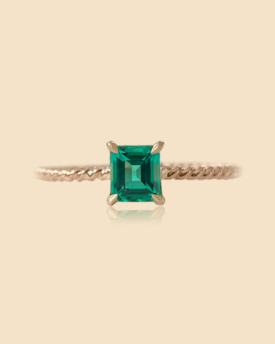 Delicate Emerald Twist Ring